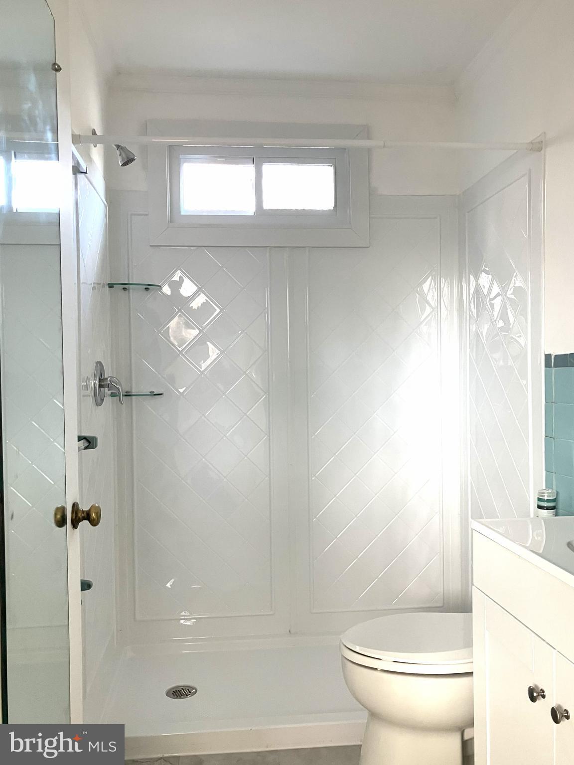 131 North Main Street New Hope, PA 18938 - Photo 14 of 23 a bathroom with a shower a toilet and a window