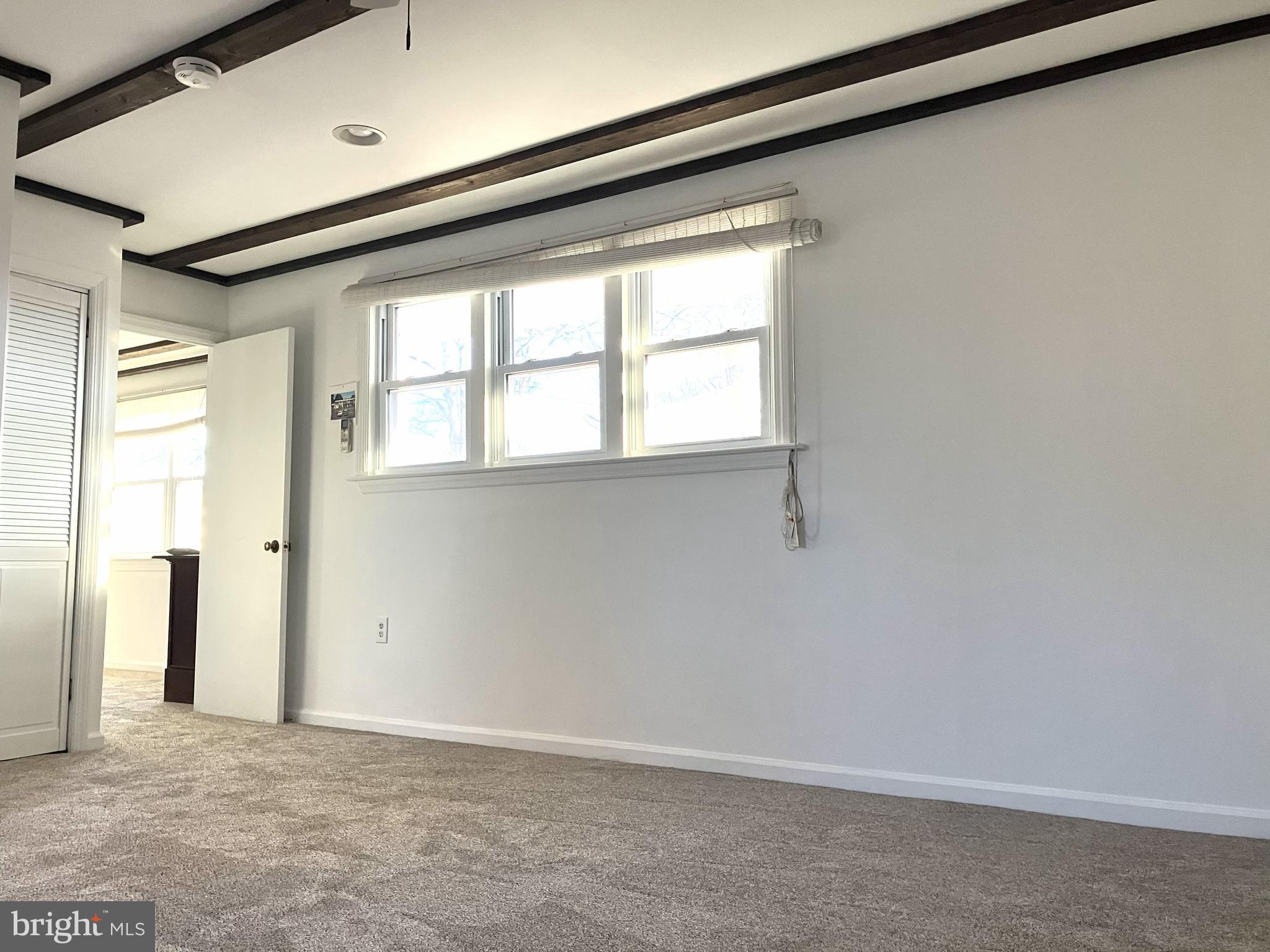 131 North Main Street New Hope, PA 18938 - Photo 15 of 23 a view of an empty room with a window