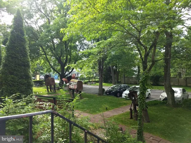 a view of outdoor space and front view of a house