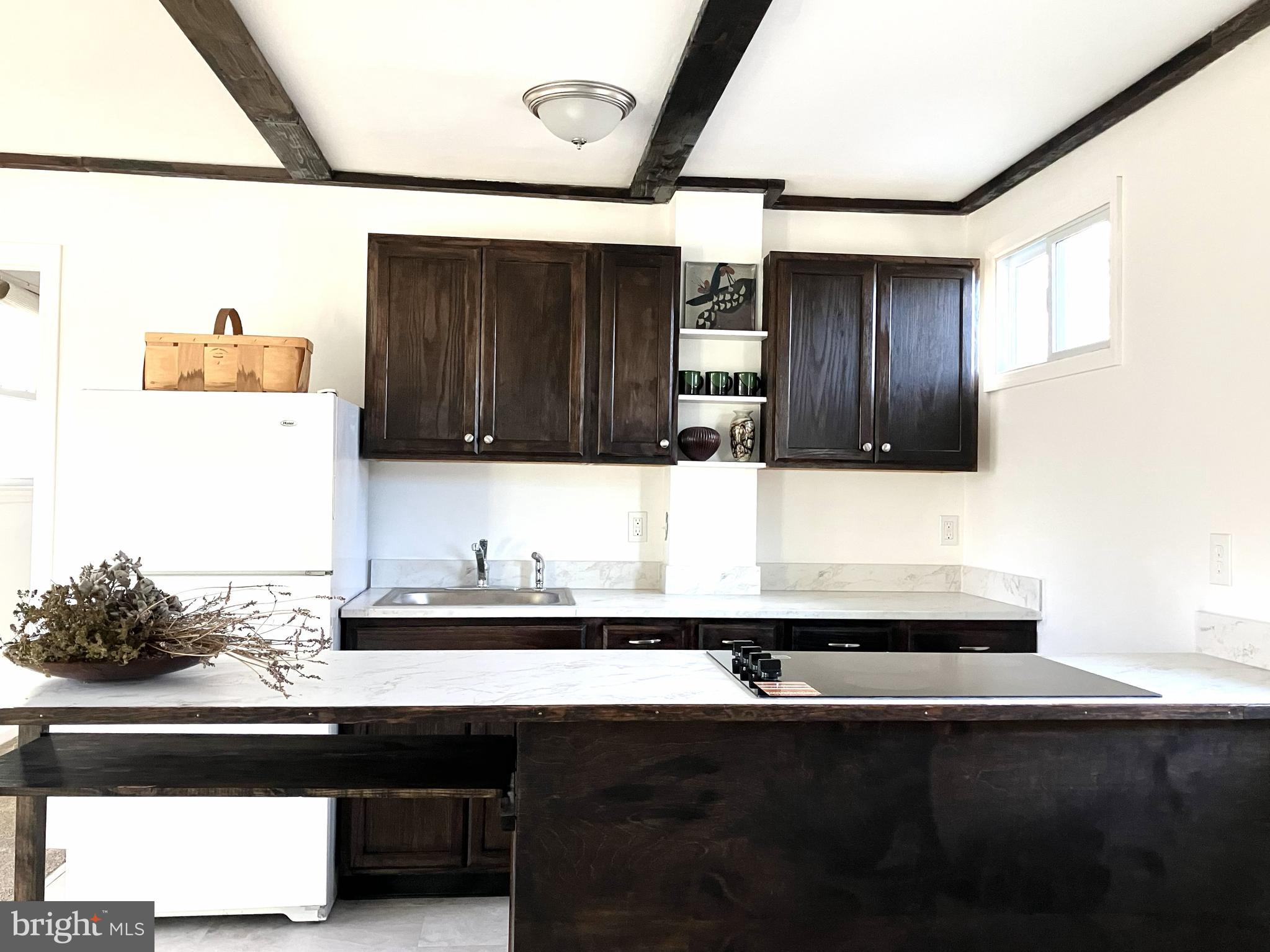 131 North Main Street New Hope, PA 18938 - Photo 7 of 26 a bathroom with a sink and a mirror
