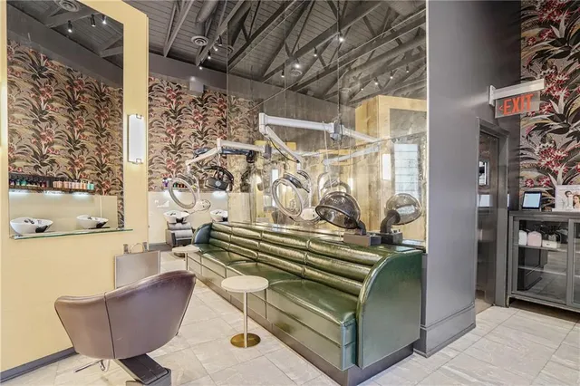 a view of living room kitchen and entryway