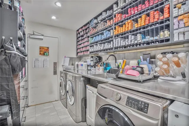 a utility room with dryer and washer