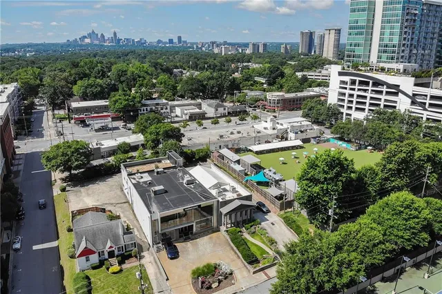 an aerial view of city lake and outdoor space