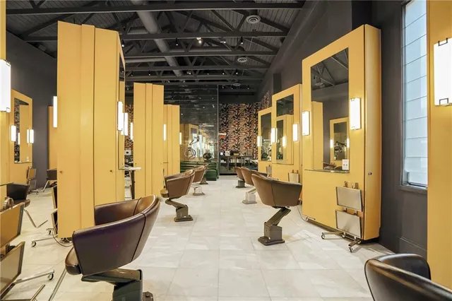 a view of living room with furniture and windows
