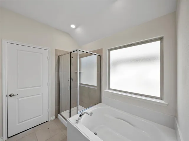 a bathroom with a double vanity sink and mirror