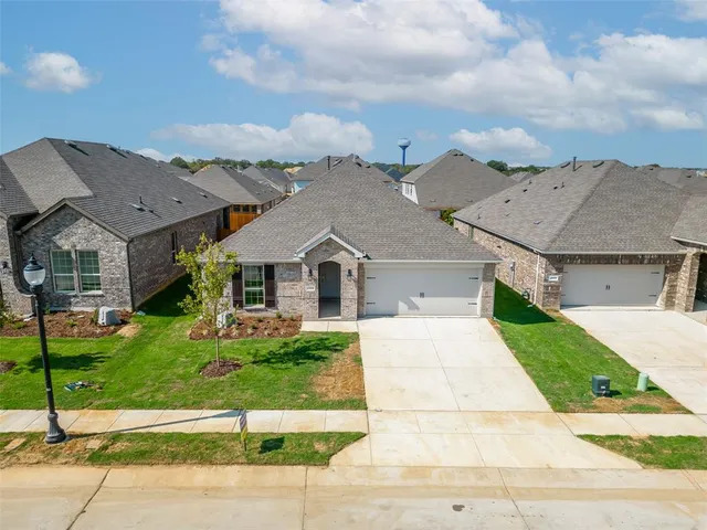 front view of house with a yard