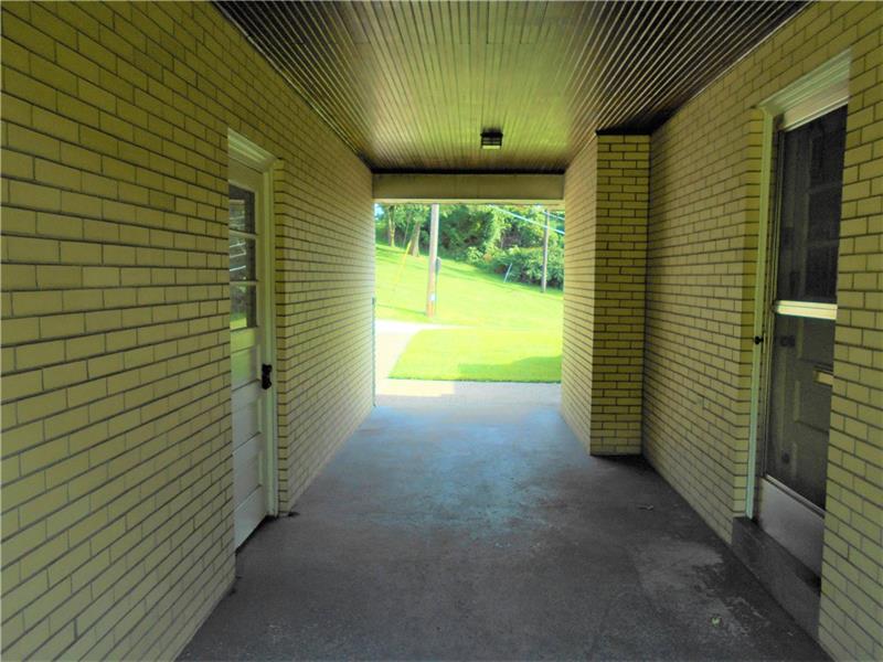 743 Braddock Road Pittsburgh, PA 15221 - Photo 5 of 25 Rare breezeway covers you from garage to kitchen.