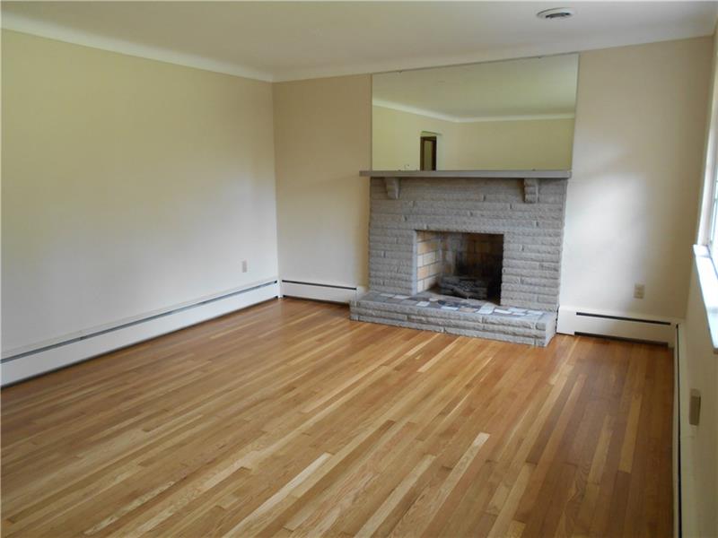 743 Braddock Road Pittsburgh, PA 15221 - Photo 6 of 25 Living room with beautiful hardwood flooring.