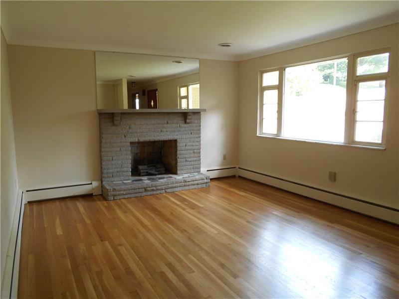 743 Braddock Road Pittsburgh, PA 15221 - Photo 7 of 25 Property is south facing, so your living room has plenty of natural light from sunrise to sunset.