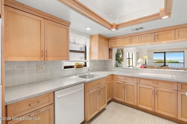 a view of a balcony with furniture