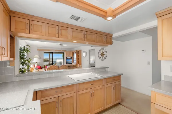 a bedroom with bed and a night stand