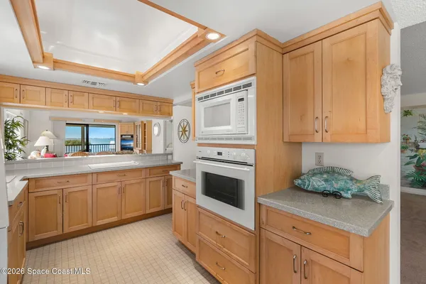 a bedroom with a bed and a mirror