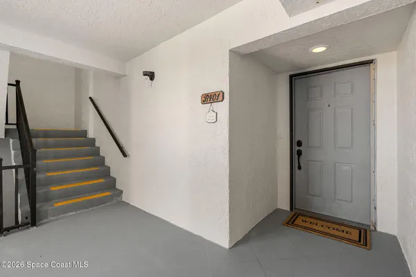 a bathroom with a toilet and a bathtub