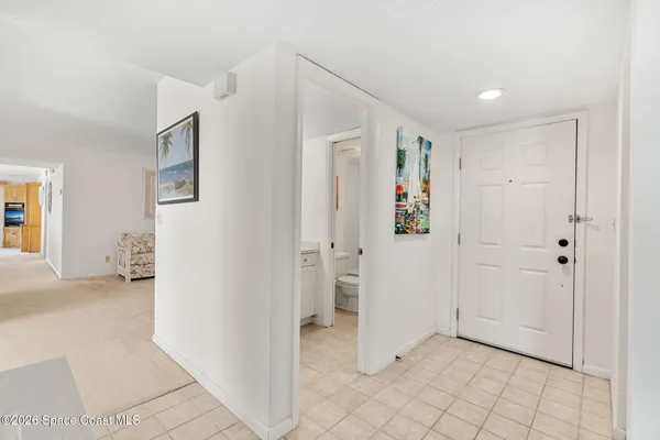 a view of storage and utility room with washer and dryer