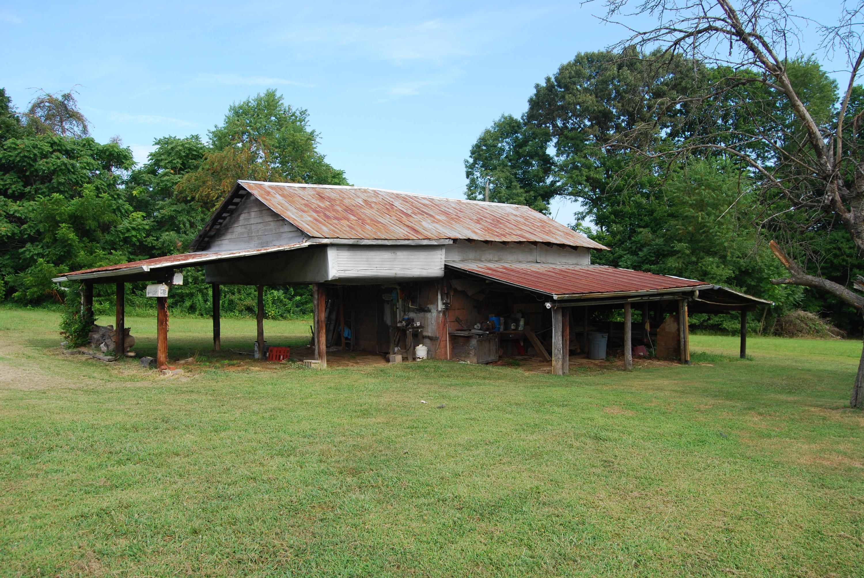 403 Morgans Fork Road Penhook, VA 24137 - Photo 3 of 5 a view of a house with backyard porch and sitting area