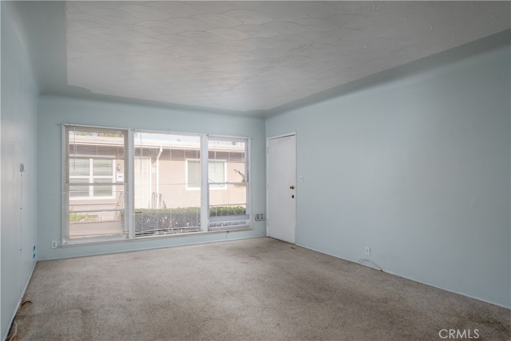 12817 Beverly Boulevard Whittier, CA 90601 - Photo 12 of 30 an empty room with a window