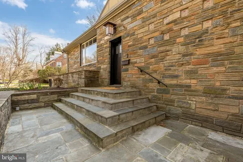 a view of entryway with a brick wall