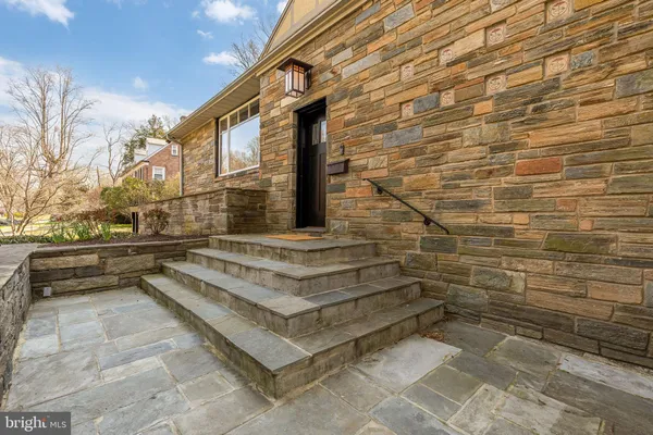 a view of entryway with a brick wall