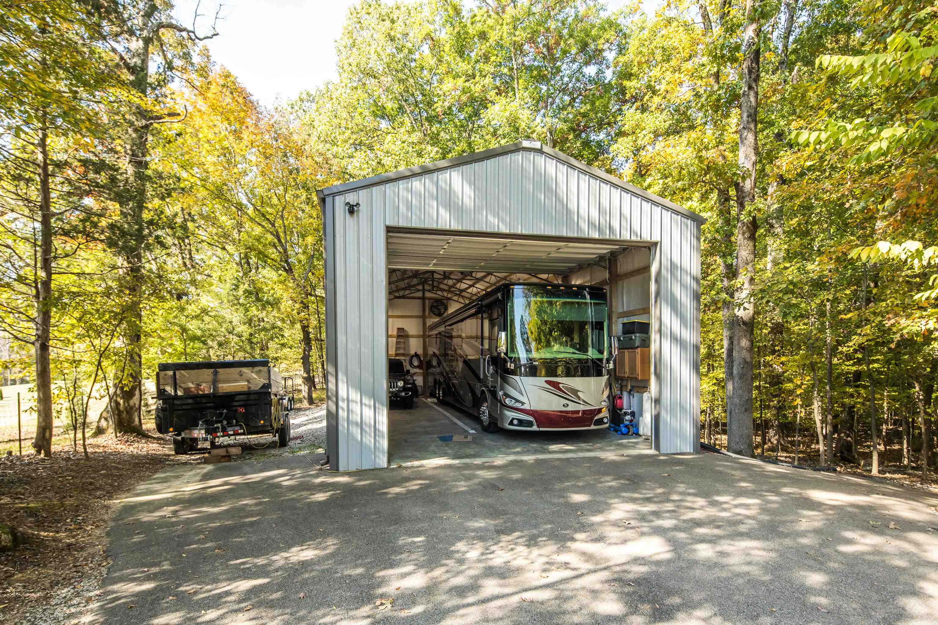 415 Wiseman Road Eads, TN 38028 - Photo 39 of 40 View of outbuilding featuring a carport and a garage