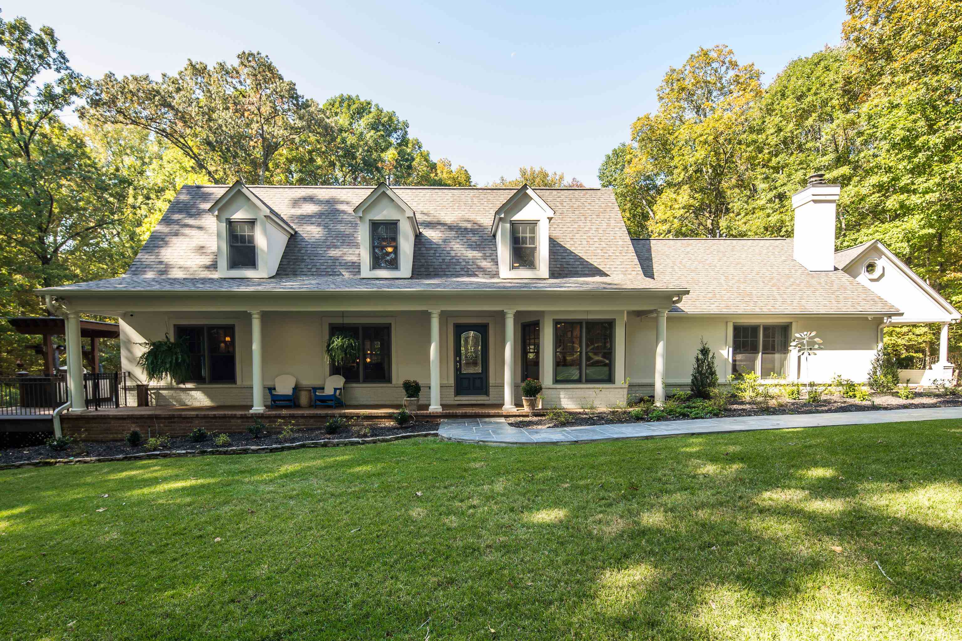 415 Wiseman Road Eads, TN 38028 - Photo 6 of 40 Cape cod-style house featuring a porch and a front yard