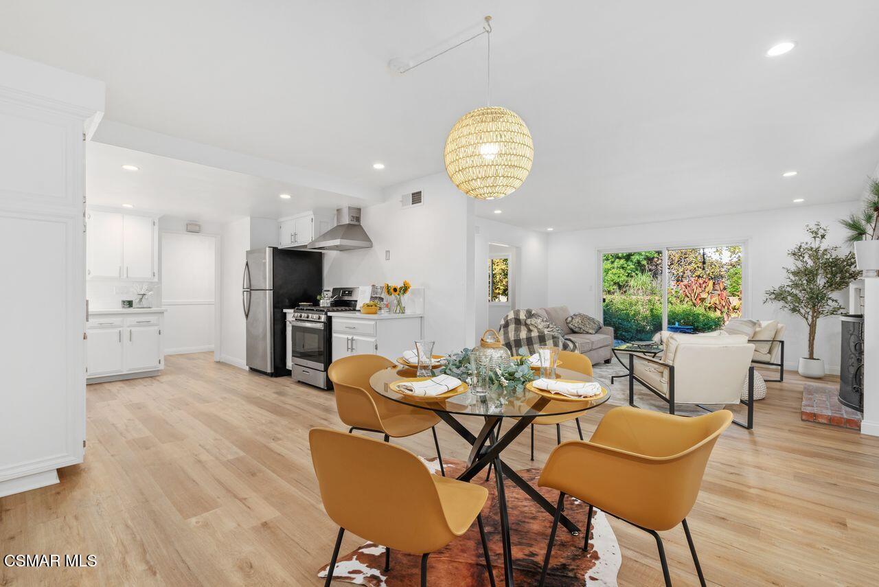 3359 Ridden Street Camarillo, CA 93010 - Photo 12 of 30 a view of a dining room with furniture and wooden floor