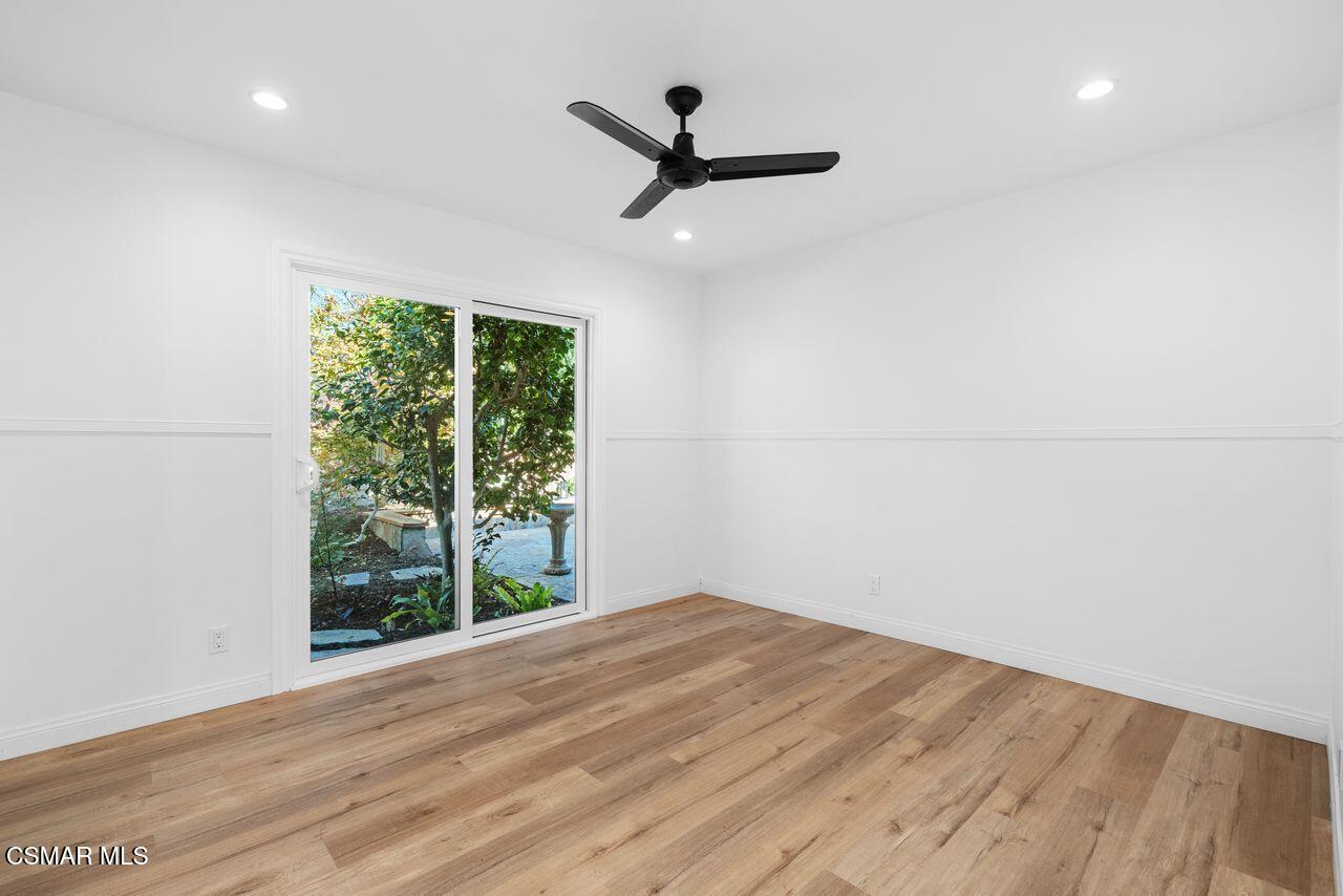 3359 Ridden Street Camarillo, CA 93010 - Photo 20 of 30 an empty room with wooden floor and windows