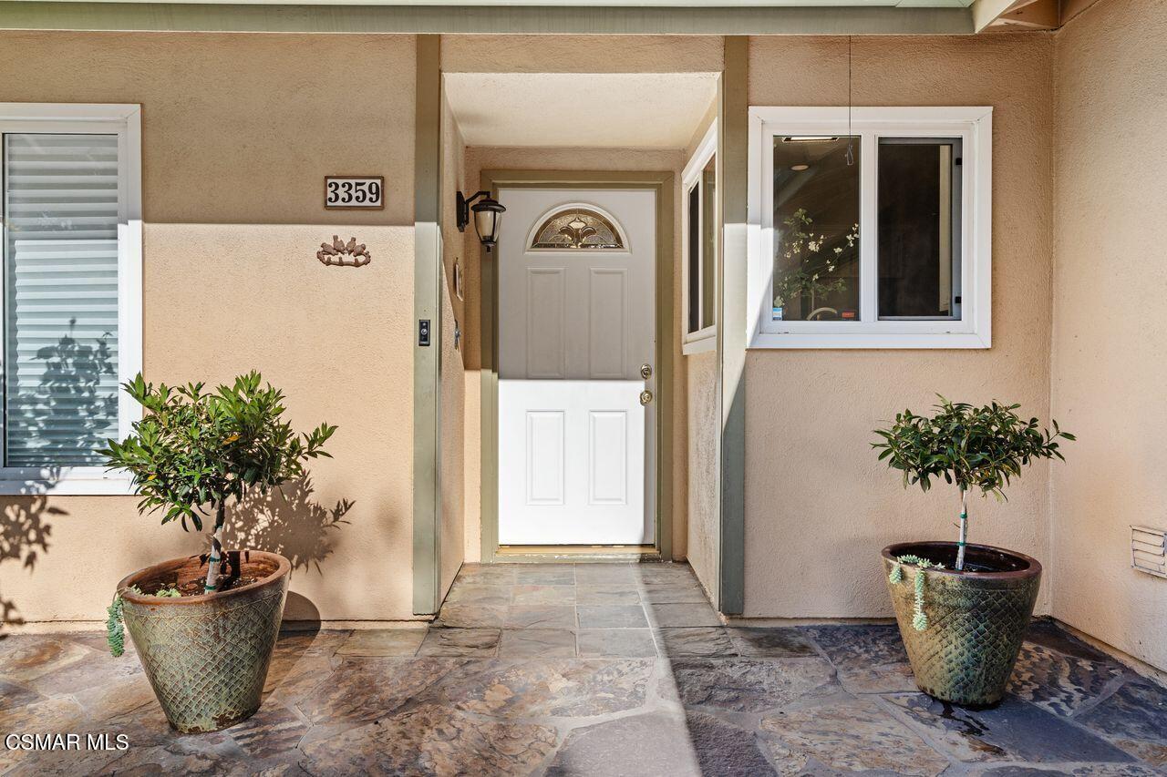 3359 Ridden Street Camarillo, CA 93010 - Photo 2 of 30 a view of a potted plants in front of a door