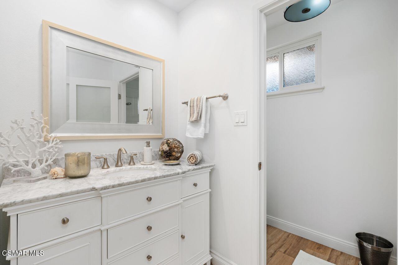 3359 Ridden Street Camarillo, CA 93010 - Photo 21 of 30 a bathroom with a sink vanity and mirror