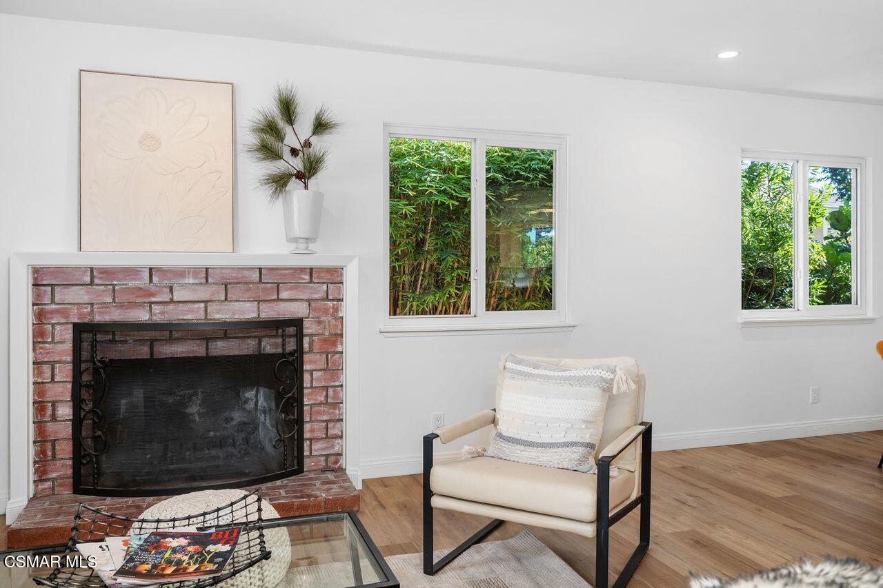 3359 Ridden Street Camarillo, CA 93010 - Photo 8 of 30 a living room with furniture and a fireplace