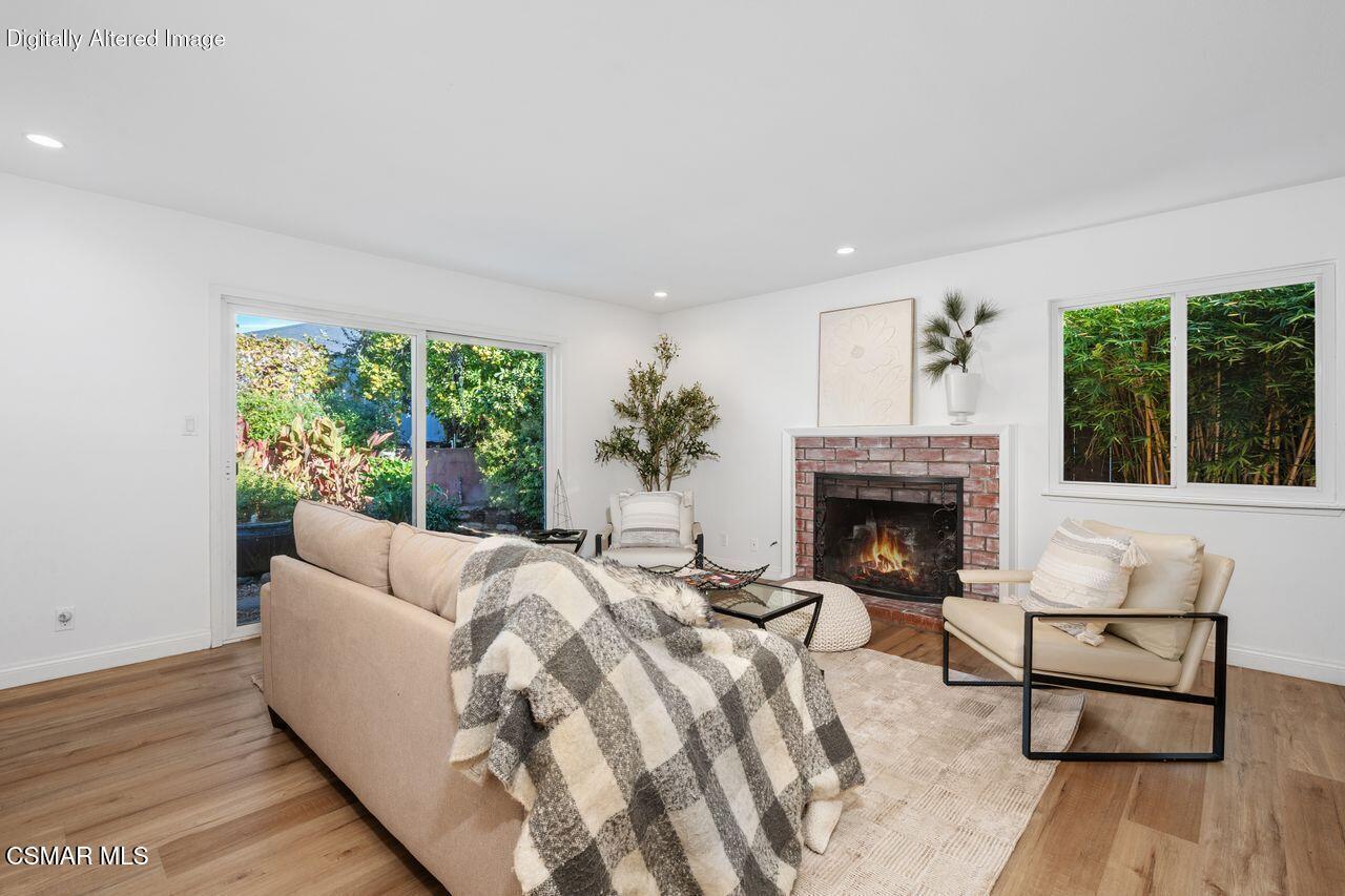 3359 Ridden Street Camarillo, CA 93010 - Photo 9 of 30 a living room with furniture and a fireplace