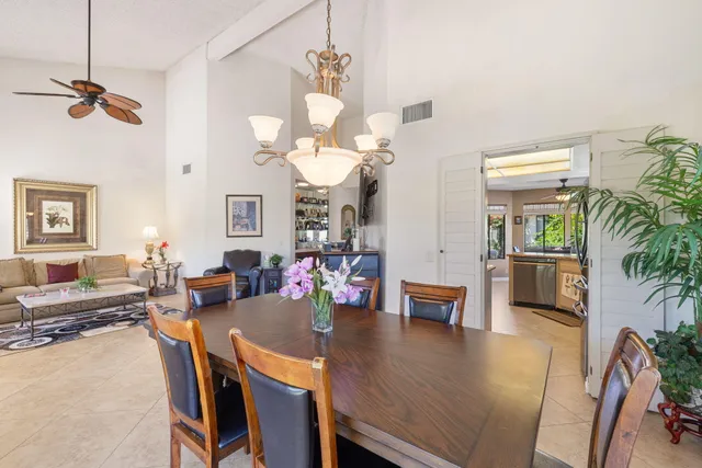 a kitchen with a stove and a white cabinets
