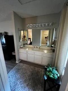 an aerial view of residential house with outdoor space and swimming pool