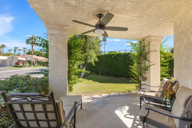 a view of swimming pool with a yard