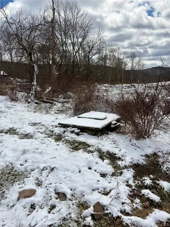 a view of a road covered in snow