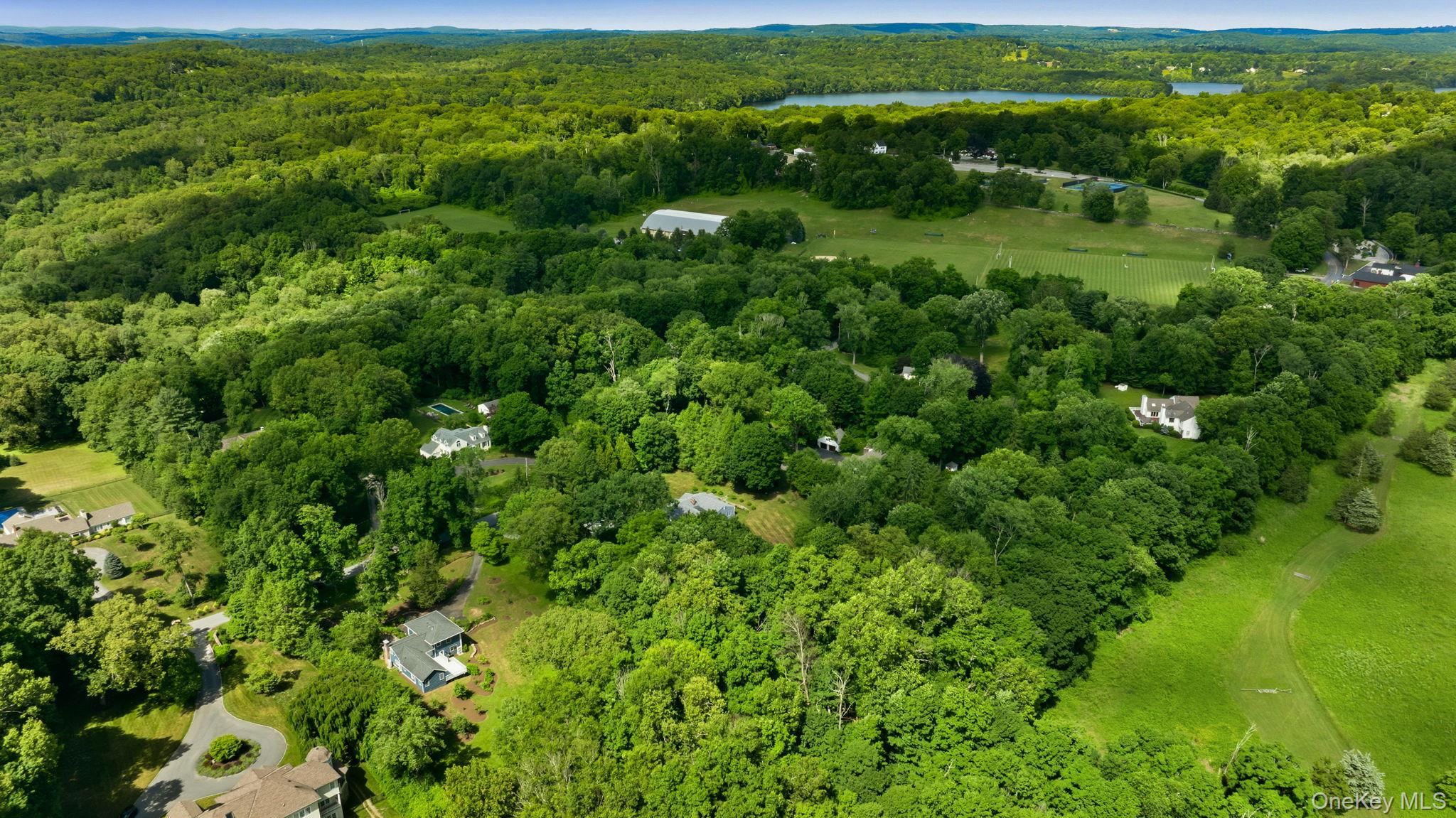 119 Mustato Road Katonah, NY 10536 - Photo 30 of 31 This view shows Beaver Dam and at the top is the Harvey School fields and skating rink