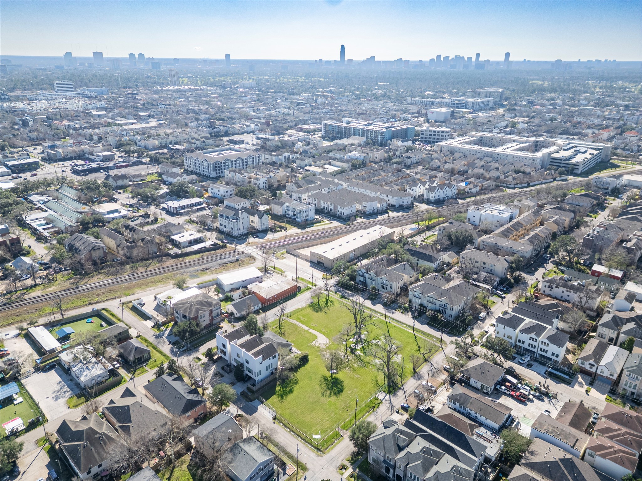 5006 Maxie Street Houston, TX 77007 - Photo 11 of 23 an aerial view of residential houses with outdoor space