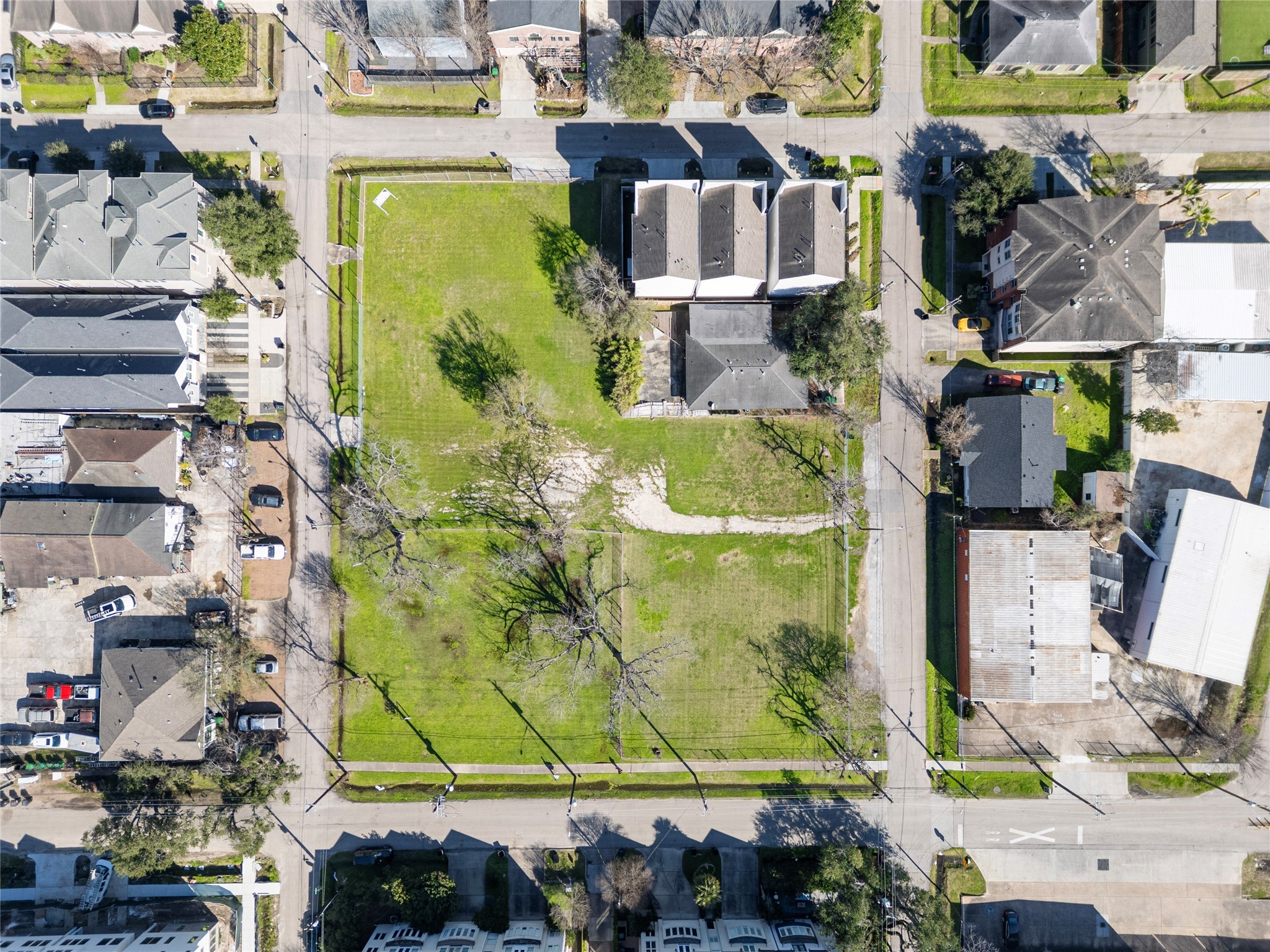 5006 Maxie Street Houston, TX 77007 - Photo 15 of 23 an aerial view of residential houses with outdoor space