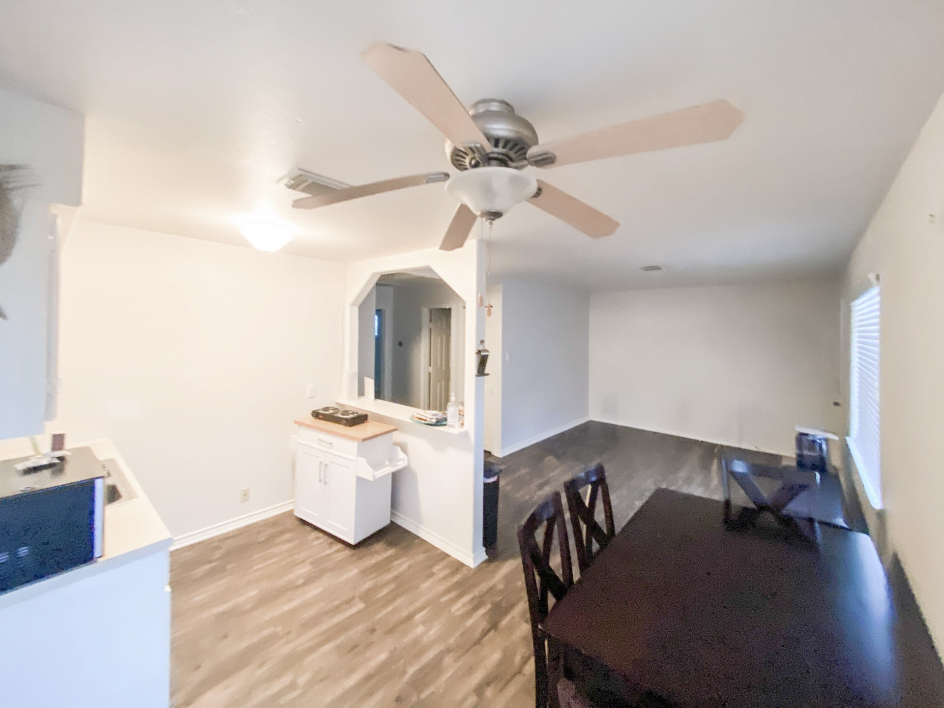 5006 Maxie Street Houston, TX 77007 - Photo 19 of 23 a living room with couches chairs and closet with wooden floor