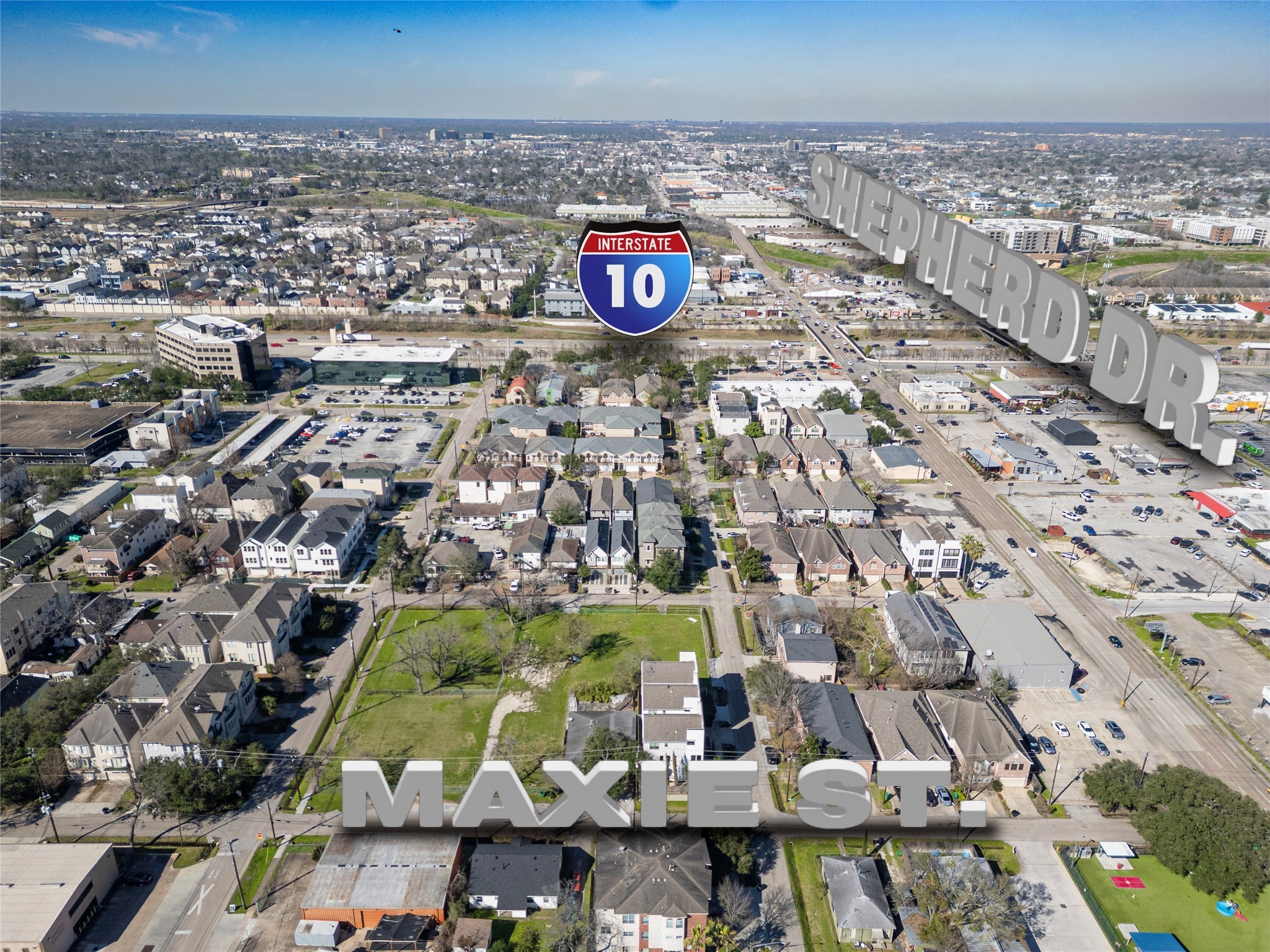 5006 Maxie Street Houston, TX 77007 - Photo 2 of 23 an aerial view of residential building and parking space