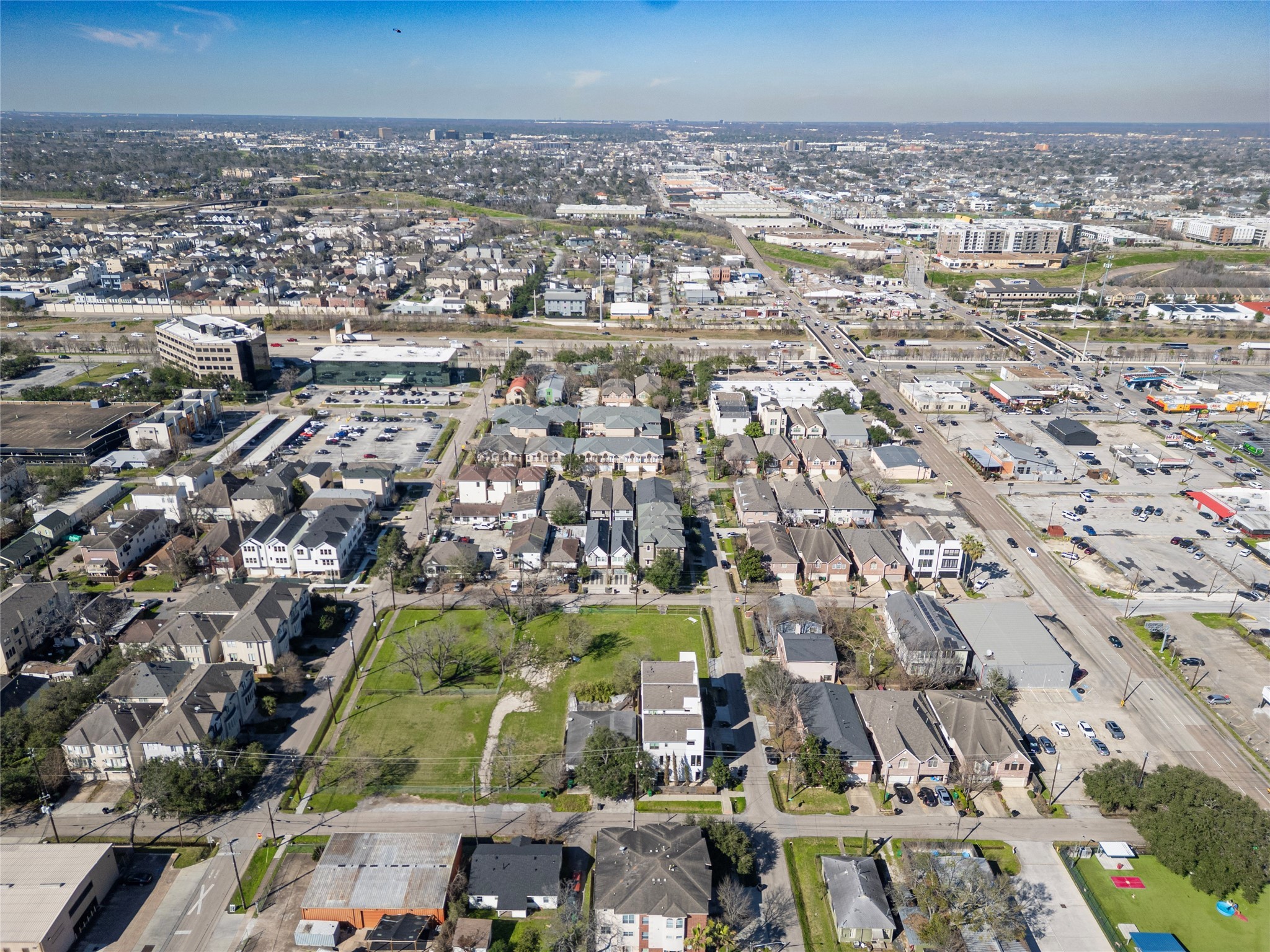 5006 Maxie Street Houston, TX 77007 - Photo 10 of 23 an aerial view of residential building and parking space