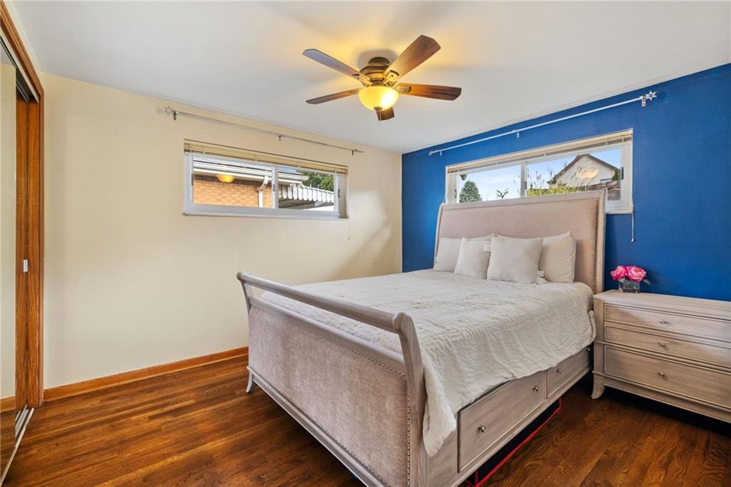 508 Montclair Street Pittsburgh, PA 15217 - Photo 18 of 29 a bedroom with bed and wooden floor