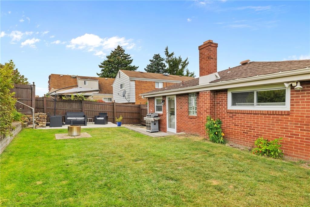 508 Montclair Street Pittsburgh, PA 15217 - Photo 27 of 29 a view of a house with patio next to a yard