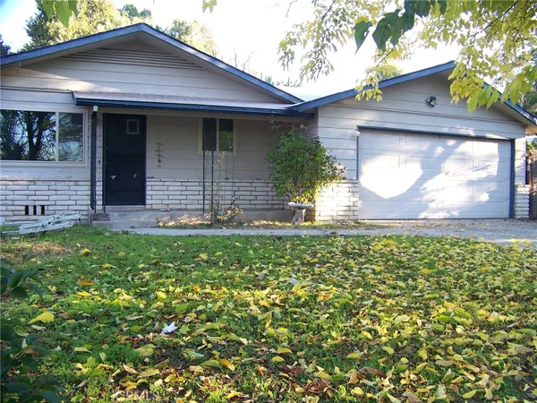 a view of a house with a garden