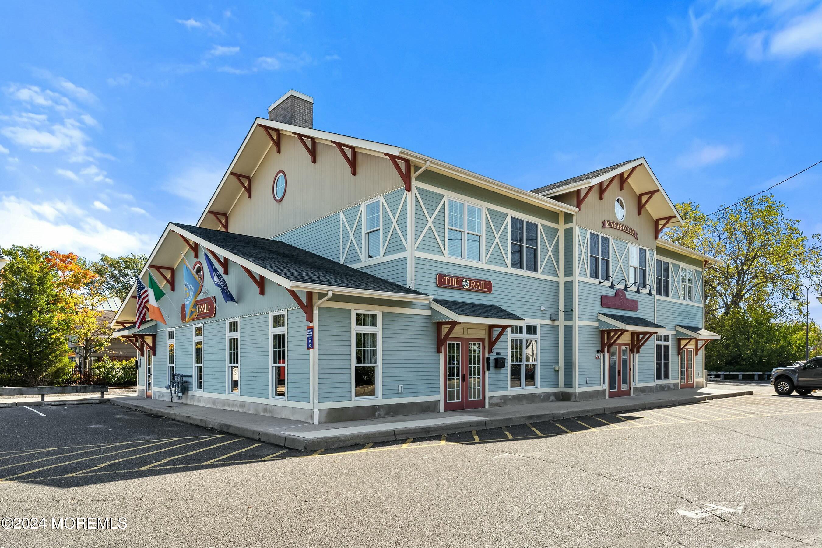 1107 Manito Road Manasquan, NJ 08736 - Photo 27 of 27 a view of a building with a street