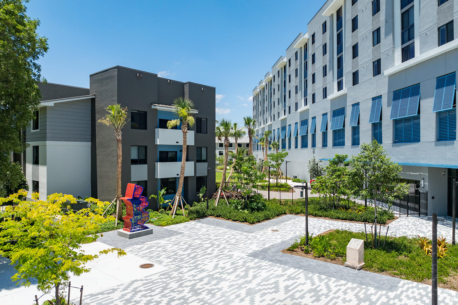 a front view of building with an outdoor seating