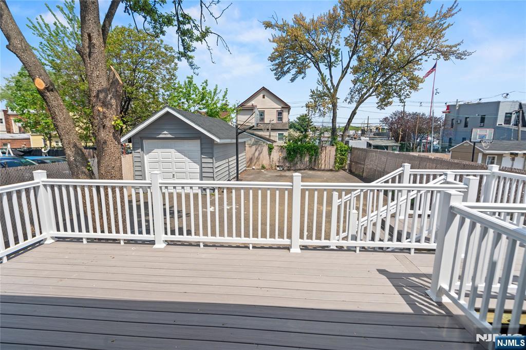 190 Washington Avenue Hackensack, NJ 07601 - Photo 16 of 20 a view of a house with wooden deck