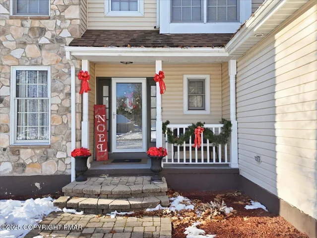 a front view of a building with an outdoor seating
