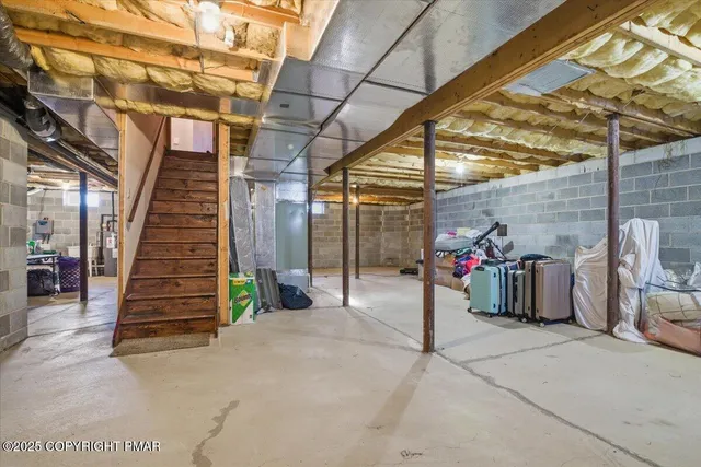 a view of a garage with a lot of stuff