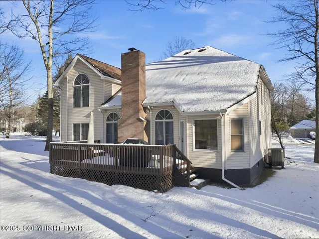 a view of a house with a roof deck