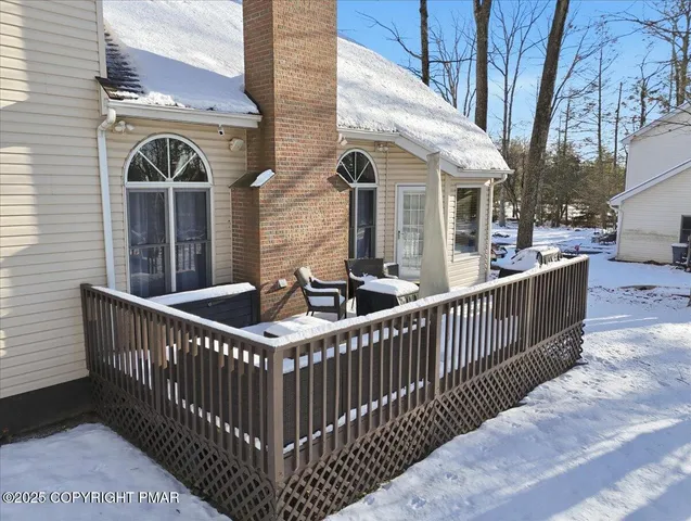 a view of a balcony with furniture